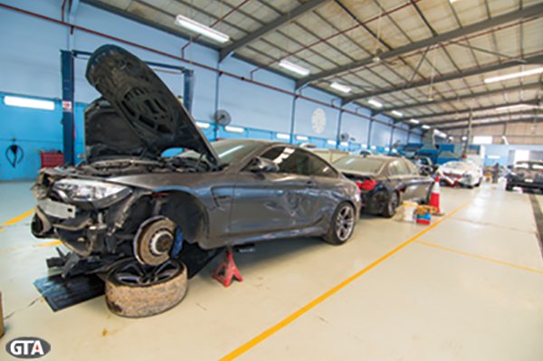 Collision-damaged vehicle prepared for repair